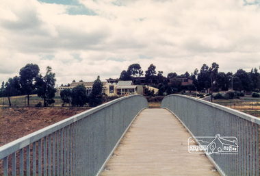 Photograph, View of Diamond Valley Library from the new pedestrian overpass; Greensborough Bypass construction, c.1986, 1986c
