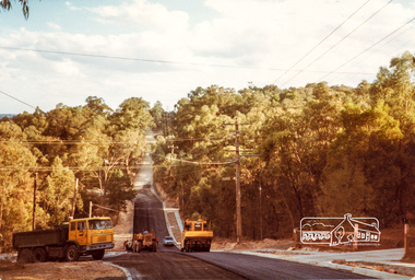 Photograph, Rolling the bitumen, road construction, Ryans Road, Eltham North, 1983, 1983