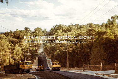Photograph, Rolling the bitumen, road construction, Ryans Road, Eltham North, 1983, 1983