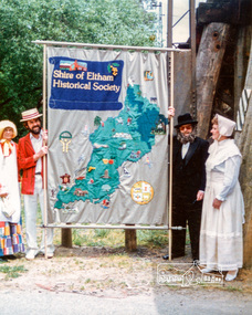 Photograph, Russell Yeoman (left) and Joh Ebeli hold the Society Banner at the end of the Parade in Panther Place near the Railway Trestle Bridge, Eltham Community Festival Parade, 8 November 1986, 08/11/1986