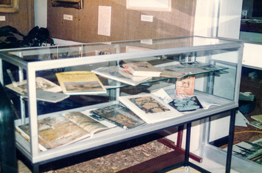 Photograph, Peter Bassett-Smith, Walter Withers display in the Shire of Eltham Historical Society cabinet purchased with funds donated by Eltham Rural Group, 1988