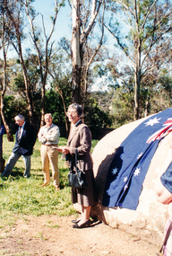 Photograph, Mary Owen, granddaughter of Walter Withers, unveiling the commemorative plaque on Walter Withers Rock at the corner of Bible and Arthur Streets, Eltham, 13 Oct 1990, 13/10/1990