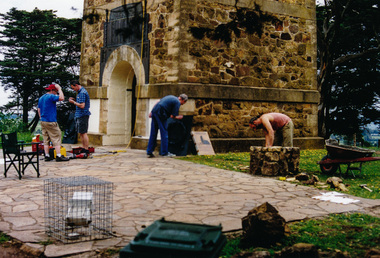 Photograph, Bronze Plaques being set in place, War Memorial Tower, Kangaroo Ground, 5 November 2001, 05/11/2001