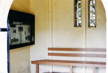 Photograph, Snowy's seat and Display Case in the entrance to the War Memorial Tower, Kangaroo Ground