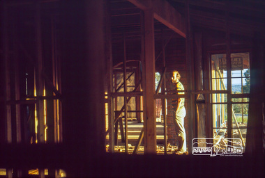 Photograph, Peter Vermey in hall, studs still exposed