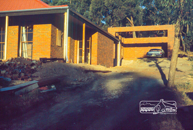 Photograph, House and garage (without roof), lock-up stage