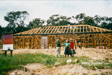 Photograph, Peter and Carla Vermey with Carla's Aunty Riena in front yard, house at framing stage; November 1979