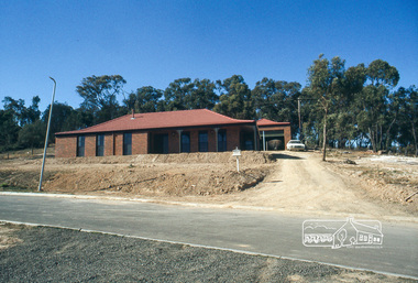 Photograph, Front of house and garage, April 1980