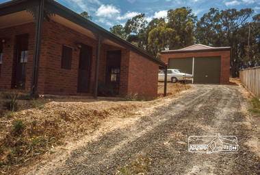Photograph, Driveway, house and garage, January 1981