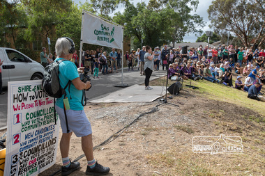 Photograph, Sarah Krug, one of the rally organisers from Save Community Reserves, addresses the crowd, Save Community Reserves Rally, Main Road, Eltham, 4 March 2018, 4/3/2018