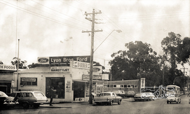 Photograph - Black and White Print, Barber Shop, 951 Main Road and Lyon Bros. Ford, 953 Main Road, Eltham, c.1972