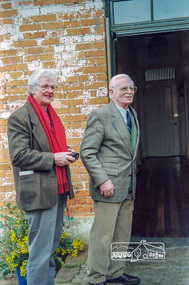Photograph, Diana and Peter Bassett-Smith unlocking the door to the Local History Centre, 12 July 1998, 12/07/1998