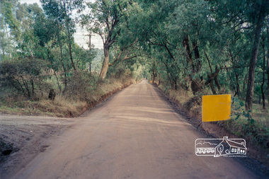 Photograph, Roadworks prior to sealing along Mount Pleasant Road near the junction with Reynolds Road, Eltham, c.1988, 1988c