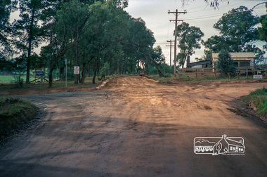 Photograph, Roadworks prior to sealing along Mount Pleasant Road near the junction with Reynolds Road, Eltham, c.1988, 1988c