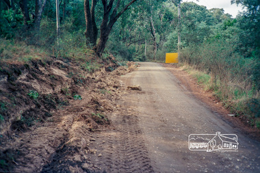 Photograph, Roadworks prior to sealing along Mount Pleasant Road near the junction with Reynolds Road, Eltham, c.1988, 1988c