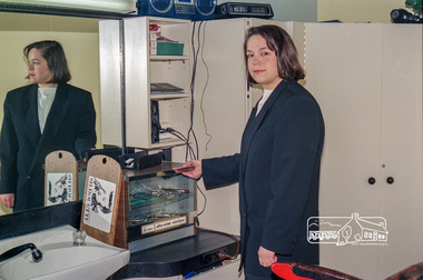 Photograph, Dianne Yans, Eltham Shire Council Health Inspector conducting an inspection at a local hairdresser, 1989, 1989