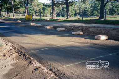 Photograph, Roadworks prior to sealing along Mount Pleasant Road near the junction with Reynolds Road, Eltham, c.1988, 1988c