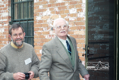 Photograph, Russell Yeoman (left) and Peter Bassett-Smith prior to unlocking the door to the Local History Centre, 12 July 1998, 12/07/1998