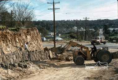 Photograph, Fred Mitchell, New embankment on southeast corner of Bridge Street and Main Road, Eltham, during duplication works, 1968