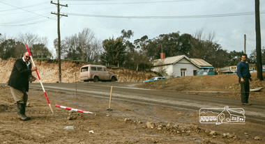 Photograph, Fred Mitchell, Surveyors laying out the new corner of Bridge Street and Main Road, Eltham, during duplication works, 1968