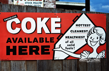 Photograph, Fred Mitchell, Fuel advertsiement sign on timber fence of A.R. Warren's Fuel Merchant business, Main Road, Eltham, 1968, 1968
