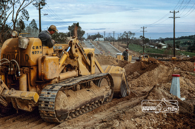 Photograph, Fred Mitchell, Road construction during duplication of Main Road near Our Lady Help of Christians Church, Henry Street, Eltham, 1968, 1968