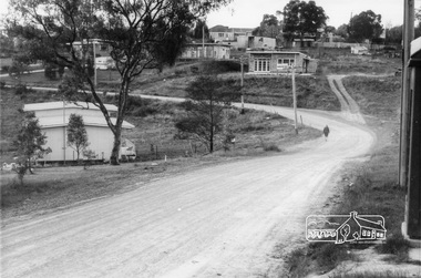Photograph, Looking north along Kett Street from near the intersection with Main Road, Lower Plenty, c.July 1967, 1967