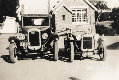 Photograph, Doug Orford's Austin Six and Ken Williams' (Headmaster's son) Baby Austin at front of State School No. 209, Dalton Street, Eltham, 1949, 1950c