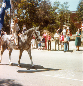 Photograph, Jock Read riding his horse, Lofty and leading the Eltham Community Festival Parade, 1980
