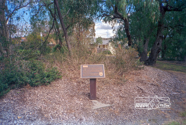 Photograph, Monument containing a time capsule in celebration of Victoria's 150th Anniversary and marking the location of the original centre of Eltham township, c. October 1990, 1990