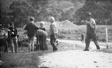 Photograph, ELTHAM ARBOR DAY 1973 - Alistair Knox with school children of the Shire of Eltham, Vic, planting native trees in the Town Park, 10 October 1973, 1973-10-10