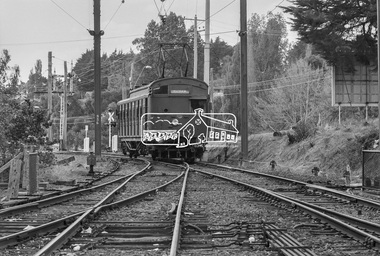Photograph, George Coop, Single Motor Carriage 471M (Red Rattler) Tait train from Hurstbridge arriving at Eltham Station, March 1980, 1980