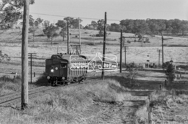 Photograph, George Coop, Hurstbridge bound Single Motor Carriage 471M Tait (Red Rattler) train near the level crossing at  Allendale Road, Eltham, March 1980, 1980