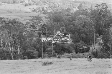 Photograph, George Coop, Eltham bound Single Motor Carriage 471M Tait (Red Rattler) train from Hurstbridge approaches the level crossing at Allendale Road, Eltham, March 1980, 1980