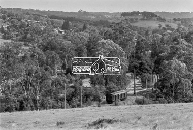 Photograph, George Coop, Eltham bound Single Motor Carriage 471M Tait (Red Rattler) train from Hurstbridge approaches the level crossing at Allendale Road, Eltham, March 1980, 1980