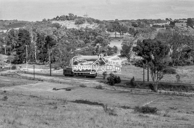 Photograph, George Coop, Eltham bound Single Motor Carriage 471M Tait (Red Rattler) train from Hurstbridge approaches the level crossing at Allendale Road, Eltham, March 1980, 1980