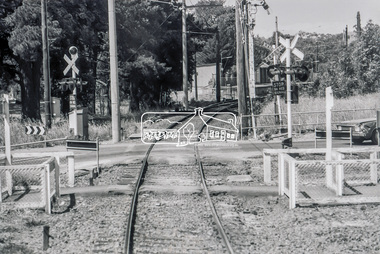 Photograph, George Coop, Level crossing at the Main Hurstbridge Road on the approach to Diamond Creek Railway Station, 6 December 1980, 1980