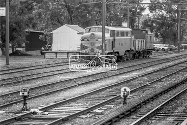 Photograph, George Coop, L1168, an L-class electric locomotive at Eltham Railway Station, c.1981, 1981