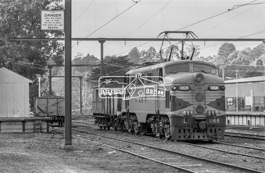 Photograph, George Coop, L1168, an L-class electric locomotive at Eltham Railway Station, c.1981, 1981