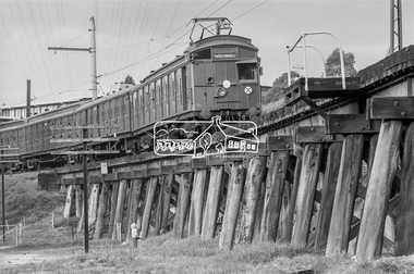 Photograph, George Coop, Tait Electric Train (Red Rattler) crossing the Railway Trestle Bridge at Eltham, c.1981, 1981