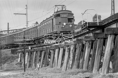 Photograph, George Coop, Tait Electric Train (Red Rattler) crossing the Railway Trestle Bridge at Eltham, c.1981, 1981
