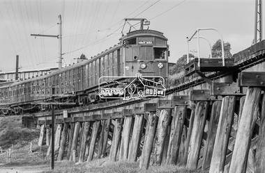 Photograph, George Coop, Tait Electric Train (Red Rattler) crossing the Railway Trestle Bridge at Eltham, c.1981, 1981