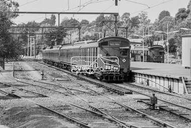 Photograph, George Coop, A (Red Rattler) Tait train for Princes Bridge and a Single Motor Carriage Tait train at Eltham Railway Station, 7-8 February 1981, 1981