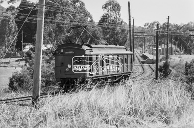 Photograph, George Coop, Hurstbridge bound Single Motor Carriage 472M Tait (Red Rattler) train approaching Wattle Glen Railway Station, 7-8 February 1981, 1981