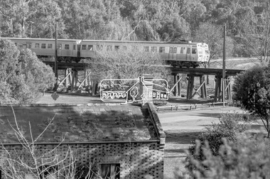 Photograph, George Coop, Hitachi train crossing Eltham Railway Trestle Bridge, c.October 1982, 1982