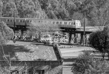 Photograph, George Coop, Hitachi train crossing Eltham Railway Trestle Bridge, c.October 1982, 1982