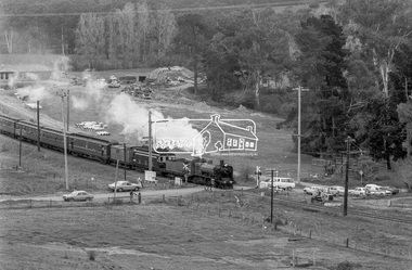 Photograph, George Coop, Vintage train excursion hauled by steam locomotive K-190 passing through the level crossing at Allendale Road, Eltham on the way to Hurstbridge, 3 July 1983, 1983