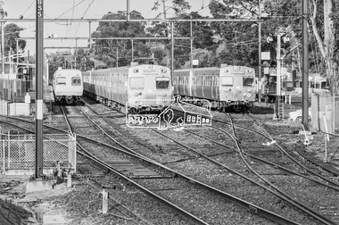 Photograph, George Coop, Comeng and Hitachi electric trains at Eltham Railway Station, 21 August 1983, 1983