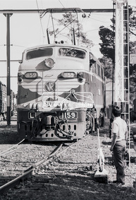 Photograph, George Coop, Victorian Railways electric locomotive L1159 at Eltham Railway Station, 23 August 1983, 1983