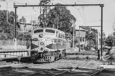 Photograph, George Coop, Victorian Railways electric locomotive L1159 at Eltham Railway Station, 23 August 1983, 1983